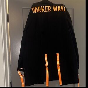 Darker Wavs Black Jacket with Orange Strap Accents